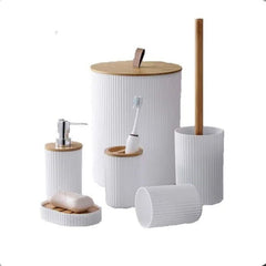 Arbaana 6-piece bathroom accessories set with ribbed blue and bamboo elements, includes soap dispenser, toothbrush holder, and storage containers.