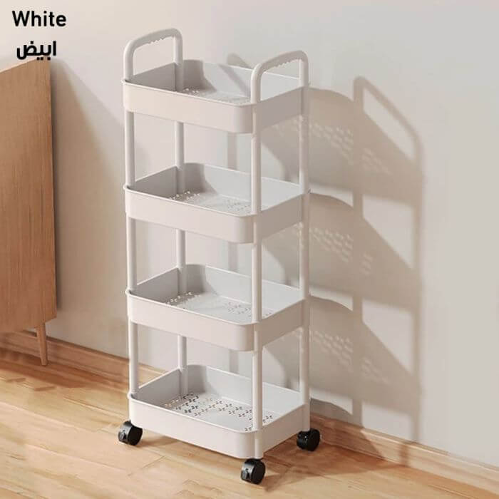 White storage cart with multiple shelves on a wooden floor against a white wall.