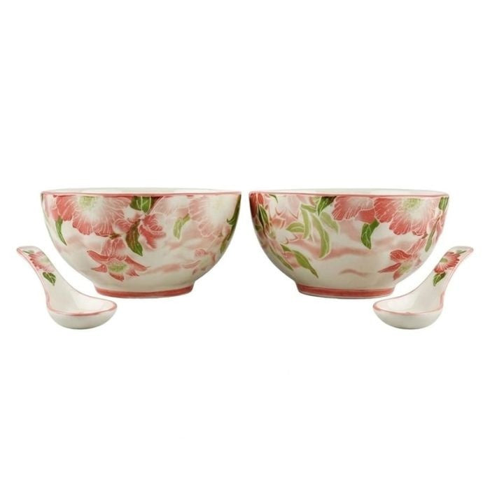 Set of two porcelain ceramic bowls with matching spoons by arbaana, showcasing smooth white finish and elegant design.