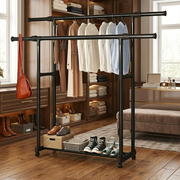 Heavy duty double clothes rack with storage shelf by arbaann, featuring sturdy metal bars and a convenient top shelf for organization.